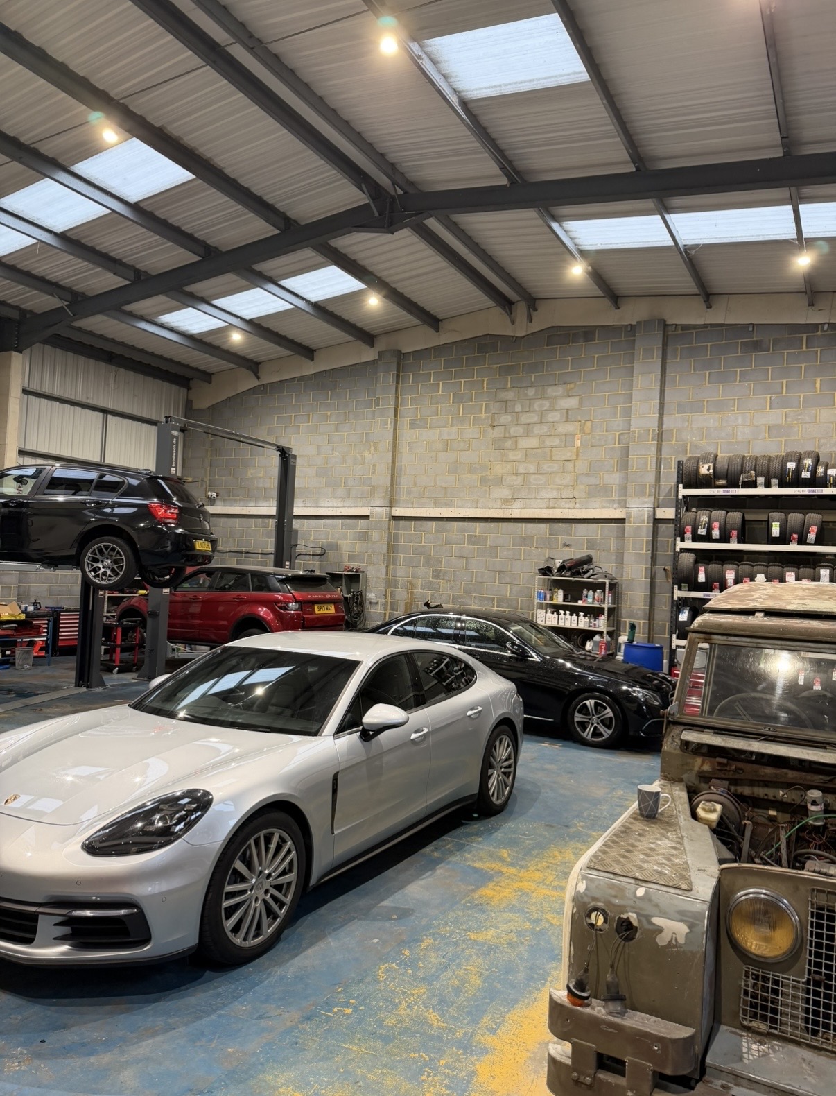 Porsche Panamera in the workshop at KITH Cars Garage & Bodyworks, Hackbridge