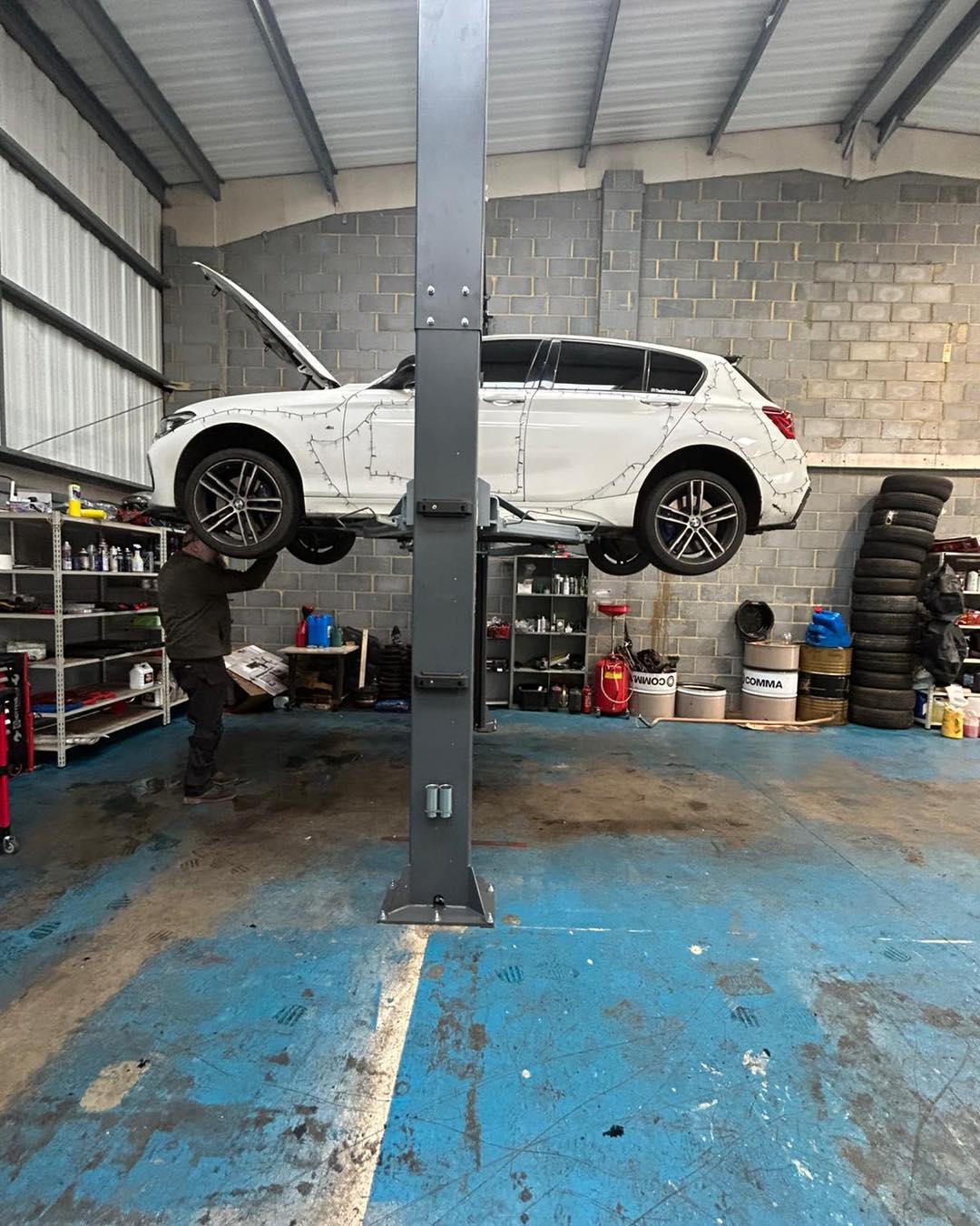 BMW on lift at KITHCARS Hackbridge workshop
